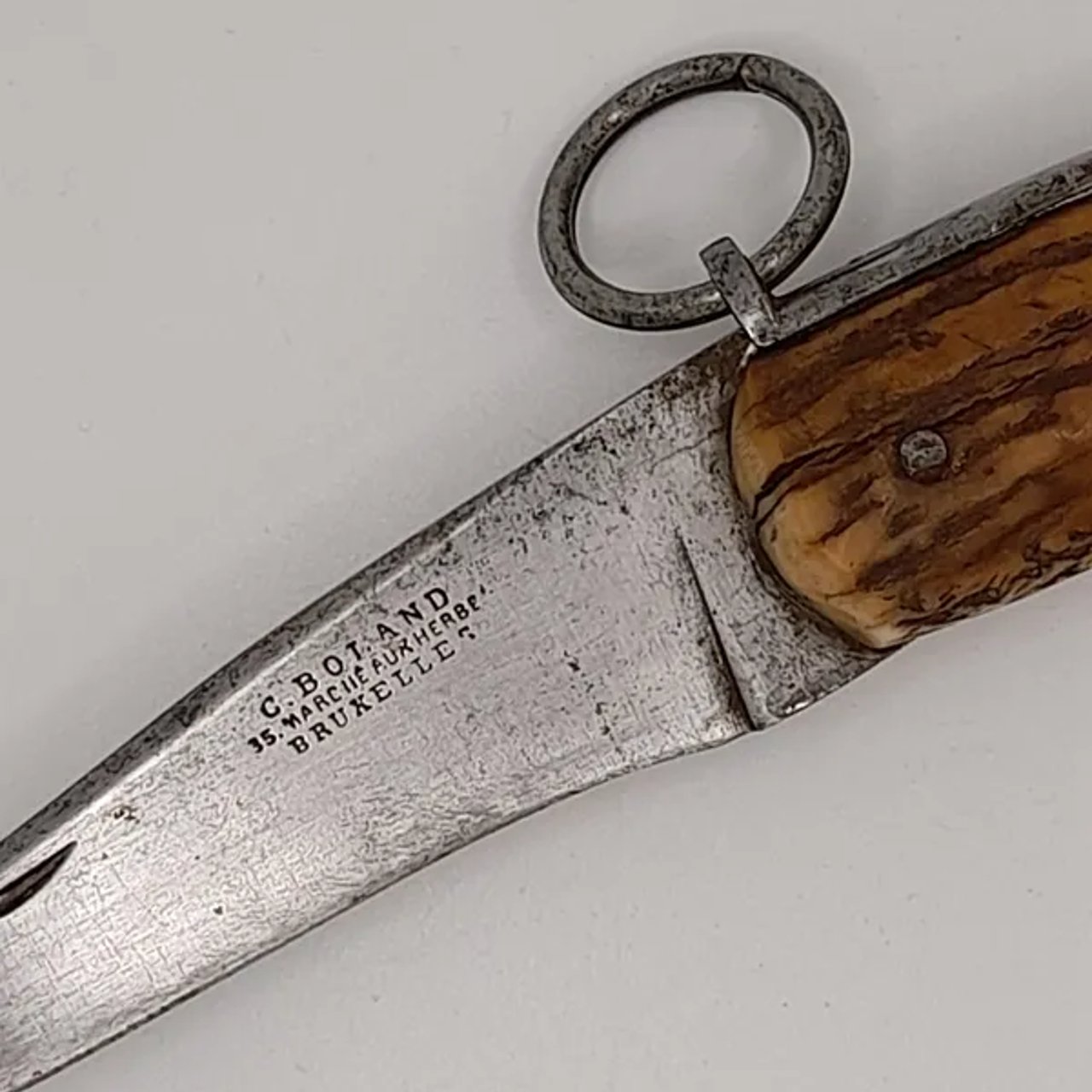 Couteau de poche 1900 en corne fabrication Belge C.BOLAND